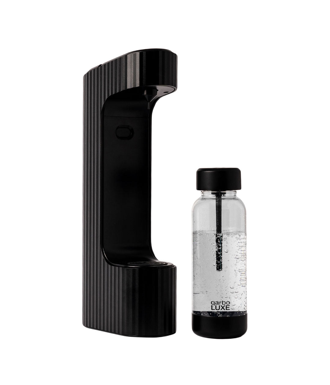 Qarbo black soda maker with sparkling drink being poured
